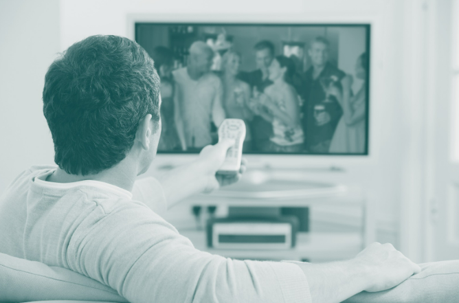 Man in loungeroom watching television