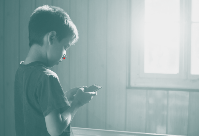 Boy using smartphone